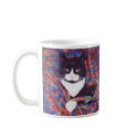 "Tiki in Doug's Afghan" mugs