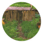 Tiny Wooden House With Mushrooms Round Sticker