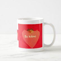 Toad frog holding a heart that says Be Mine ? Mugs