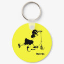 Toddler riding scooter keychains