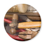 Tools in a messy toolbox magnets