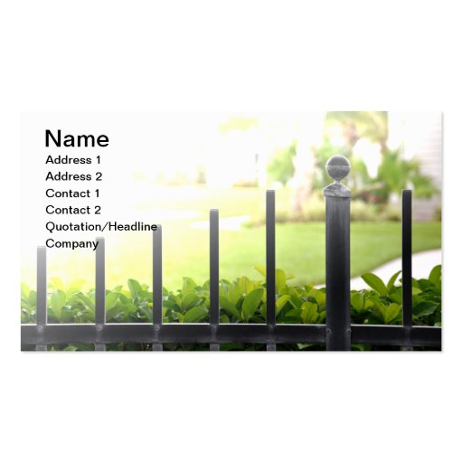 top of an outdoor black iron fence business cards
