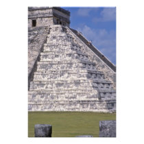 Tourists climbing stairs of El Castillo, stone
