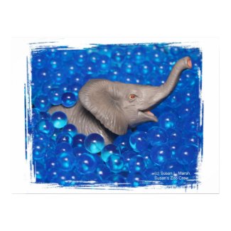 Toy grey elephant in blue bubbles print
