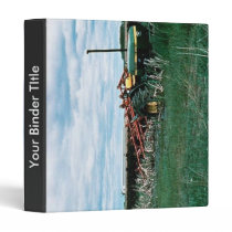 Tractor Bogs plowing wetlands Binder