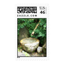 Tranquil Garden Fountain With Flowing Water postage