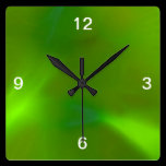 Translucent green wall clocks
