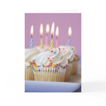 Tray of birthday cupcakes with candles card