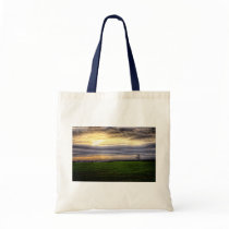 Tree at sunset tote bag bags
