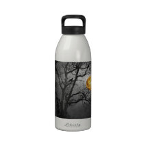 Tree full of ravens with a full moon. drinking bottles
