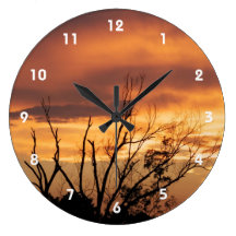 Tree in sunset Wall Clock