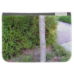 Tree Trunk along concrete path Cases For The Kindle