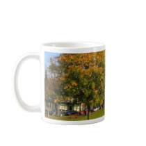 Tree With Falling Leaves In Autumn mugs by lifesphere Tree With Falling Leaves In Autumn mugs