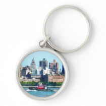 Tugboat Against Manhattan Skyline keychains