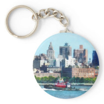Tugboat Against Manhattan Skyline keychains