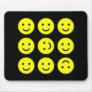 Tumbling Smileys - On Black mousepad