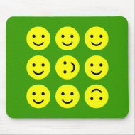 Tumbling Smileys - On Green mousepad