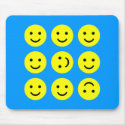 Tumbling Smileys - On Mid-Blue mousepads