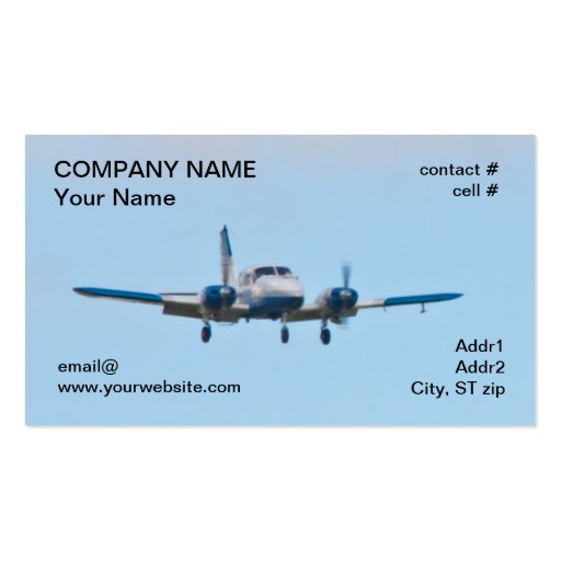 Twin airplane on landing approach business card