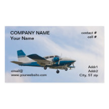Twin airplane on landing approach business card templates