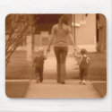 twins walking along sidewalk mousepads