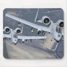 Two A-10C Thunderbolt II aircraft fly in format Mousepad