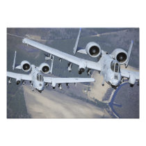 Two A-10C Thunderbolt II aircraft fly in format