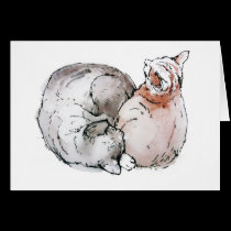 Two cats sleeping cards