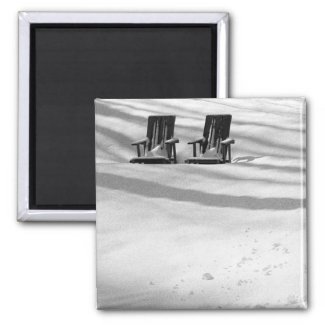 Two Chairs Buried In Snow