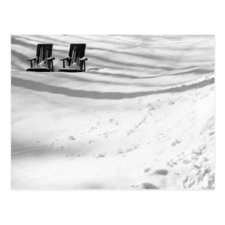 Two Chairs Buried In Snow