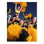 Two cheerleaders riding on shoulders of football postcard