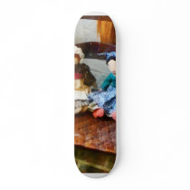 Two Colonial Rag Dolls skateboards