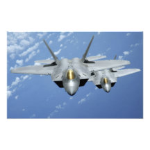 Two F-22 Raptors fly over the Pacific Ocean Photograph