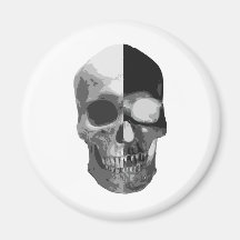 Two faced inverted skull refrigerator magnet