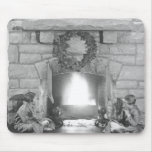Two girls sitting by a fireplace at Christmas Mouse Pads