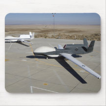 Two Global Hawks parked on a ramp Mousepads