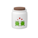 Two green frogs with red hearts. candy jars