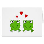Two green frogs with red hearts. greeting cards