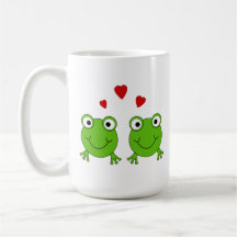 Two green frogs with red hearts. mugs