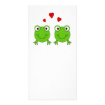 Two green frogs with red hearts. photo card template