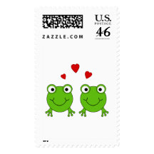 Two green frogs with red hearts. postage stamp