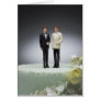 Two groom figurines on top of wedding cake greeting card Two groom figurines on top of wedding cake greeting card