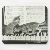 Two kitten playing on piano keyboard, (B&W) Mouse Pads