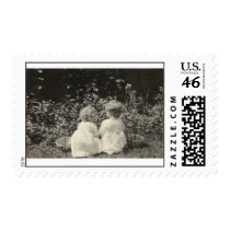 Two little children by basket stamps