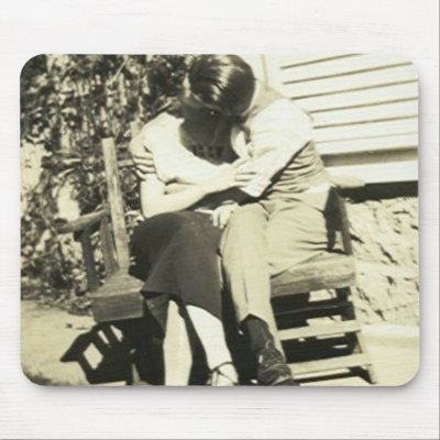 lovers kissing wallpapers. Two lovers kissing on a bench