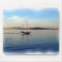 Two-masted sailboat motoring on bay mousepads by jeffwqc Two-masted sailboat motoring on bay mousepads