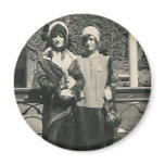 Two men in drag out on the town magnet