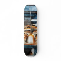 Two Oil Cans Skateboards