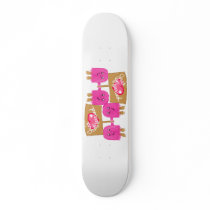 Two pink Just Married skateboards