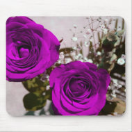 Two roses coloured purple with stems mousepad